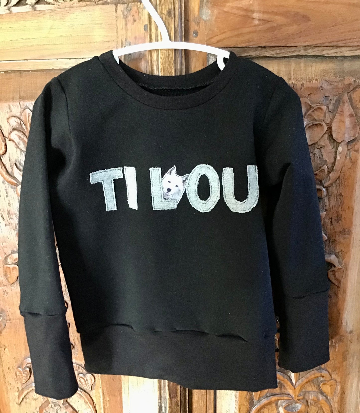 Ti Lou black hoodie ready to go